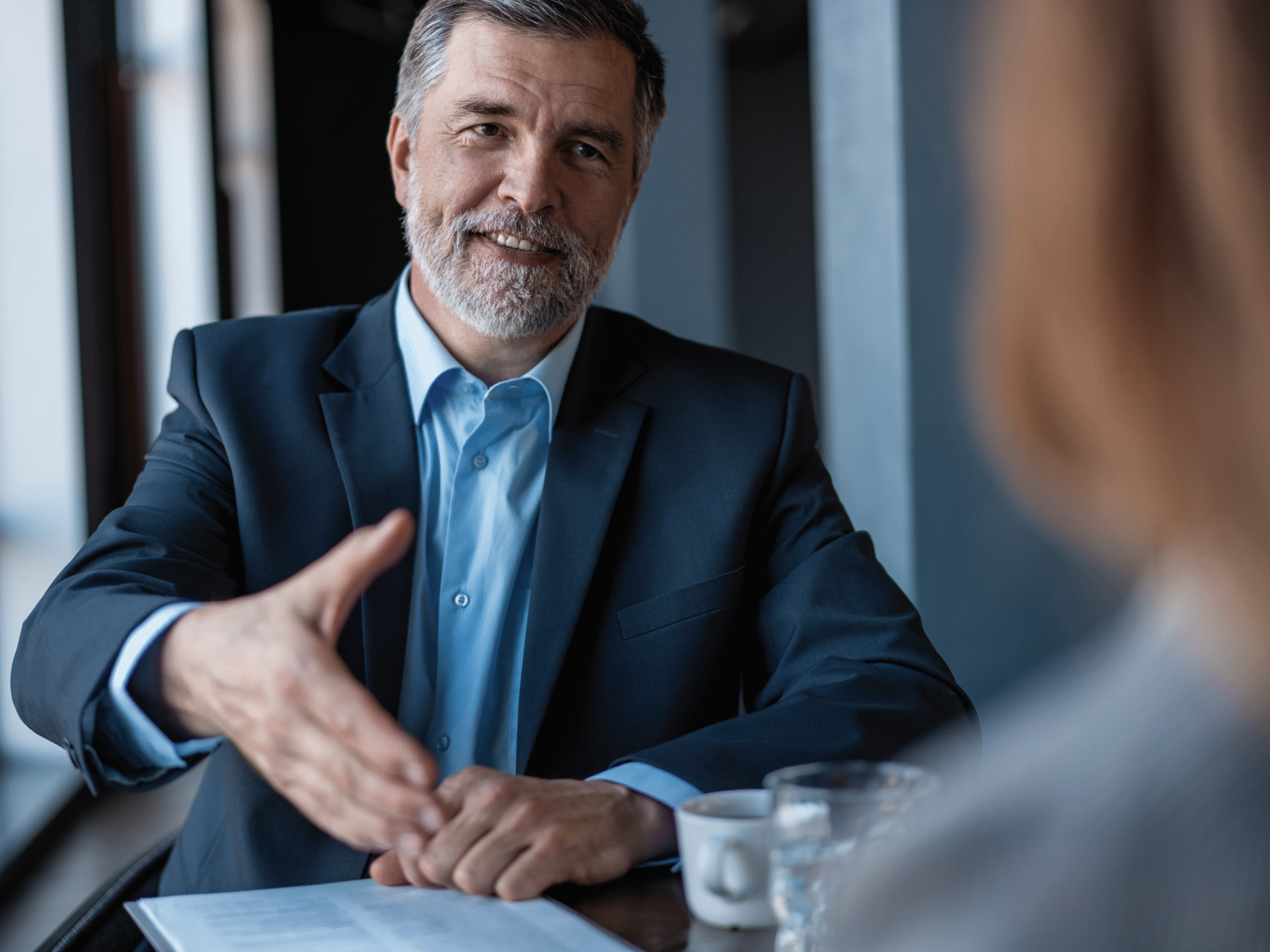 Business Coaching - Executive Coaching - benefitIMPACT Business Coach im Coachinggespräch - Business Coaching - Executive Coaching - benefitIMPACT