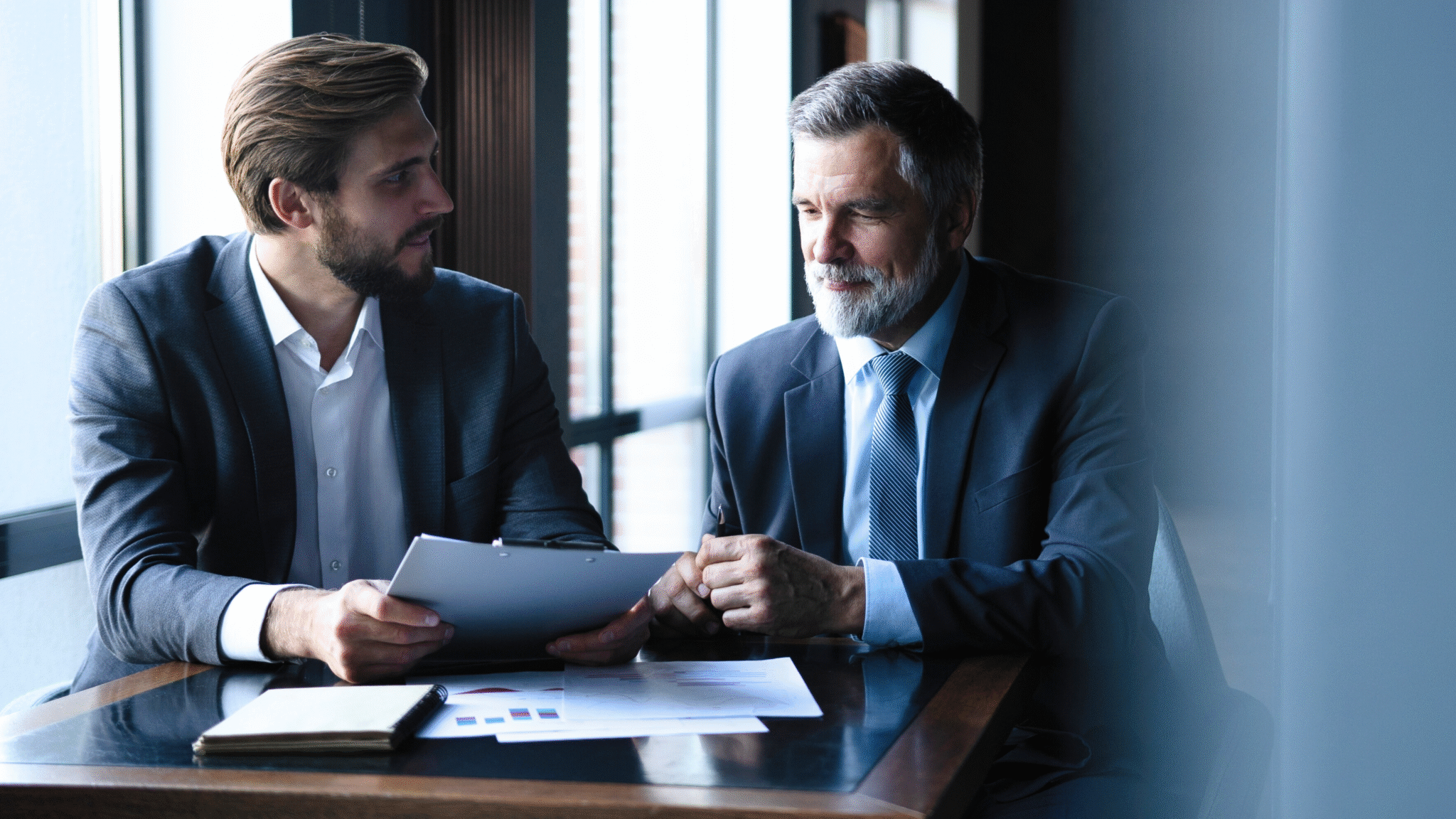 Business Coach im Coachinggespräch - Business Coaching & Executive Coaching - benefitIMPACT